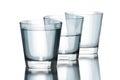 tree water glasses empty half and full philosophy Royalty Free Stock Photo