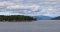 Treed Island with Homes and docks, surrounded by other islands Royalty Free Stock Photo