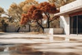 Trees with autumn orange foliage after the rain against the background of an ultra-modern minimalist building made of