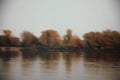 Dynamic, bird flying, river , reflections, trees, autumn colours and atmosphere