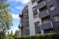 Trees, blue sky and building with balconies Royalty Free Stock Photo