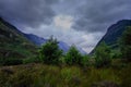 Trees and clouds, Ben Nevis range Royalty Free Stock Photo