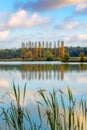 Trees and clouds reflections on a pond in autumn, Burgundy France