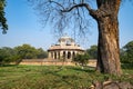 Trees frame the Isa Khans Garden Tomb, part of Humayan`s Tomb Royalty Free Stock Photo