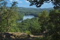 Trees framing Hart Ponds below ridge of Ragged Mountain, Connecticut. Royalty Free Stock Photo