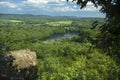 Trees framing Hart Ponds below ridge of Ragged Mountain, Connecticut. Royalty Free Stock Photo