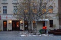 Trees in front of the Kolegiacki Hotel on the Plac Kolegiacki square Royalty Free Stock Photo