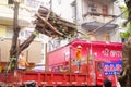 The trees in the garden workers handling typhoon toppled