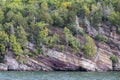 Trees growing on rocky cliffside on Lake Champlain, Vermont USA