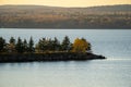 Trees growing on a sand bar in Lake Superior in Ashland Wisconsin. Taken at sunset in the fall Royalty Free Stock Photo