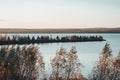 Trees growing on a sand bar in Lake Superior in Ashland Wisconsin. Taken at sunset in the fall Royalty Free Stock Photo