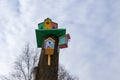 Trees with lots of colorful birdhouses for birds . Bird house on a tree Royalty Free Stock Photo