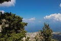 Trees and panoramic views from the castle of Saint Hilarion to the city of Kyrenia, the sky and the Mediterranean sea. Royalty Free Stock Photo