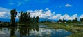 trees reflection water clouds nature Royalty Free Stock Photo