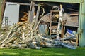 Trees in the sawmill are stacked in bags for sell. Stacks of firewood. Preparation of firewood for the winter. A heap of woodpile Royalty Free Stock Photo