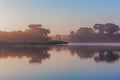 Early morning fog over river at sunrise. Royalty Free Stock Photo