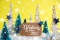 Trees, Snowflakes, Yellow Background, Label, Merry Christmas And Happy 2022 Royalty Free Stock Photo