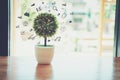 Trees on the table have financial and medical symbols laid around them. Business Growth Concepts.