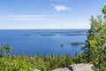 Trees on The Ukko-Koli Hill and view to Lake Pielinen on the background, Koli National Park, North Karelia, Finland Royalty Free Stock Photo