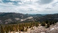 Trees on the valley with a mountain top covered with snow Royalty Free Stock Photo