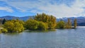 Trees with yellow autumn leaves at Lake Aviemore in Canterbury