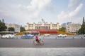 Treet in front of the Sichuan Science and Technology Museum and statue of Chairman Mao Zedong.