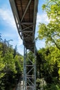 Treetop path through the mixed forest at the northern edge of the Harz, view from below to the supports and wooden planks Royalty Free Stock Photo