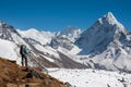 Trekker approaching Amadablam mount in Khumbu valley on a way to Royalty Free Stock Photo