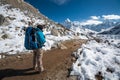 Trekker approaching Amadablan mount in Khumbu valley on a way to Royalty Free Stock Photo