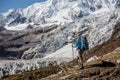 Trekker in front of Manaslu glacier on Manaslu circuit trek in N