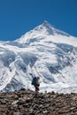 Trekker in front of Manaslu glacier on Manaslu circuit trek in N