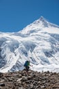 Trekker in front of Manaslu glacier on Manaslu circuit trek in N