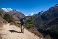 Trekker in Khumbu valley on a way to Everest Base camp Royalty Free Stock Photo