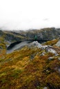 Trekker on Munken Mountain trail, Lofoten Islands, Norway Royalty Free Stock Photo