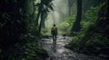 A trekker in the rain forest, in the rain, with difficulty