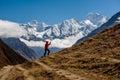 Trekker rests on Manaslu circuit trek in Nepal Royalty Free Stock Photo