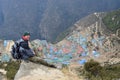 Trekker sitting above Namche Bazaar town,Nepal.Asia Royalty Free Stock Photo