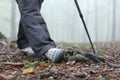 Trekker spraining ankle walking in a forest Royalty Free Stock Photo