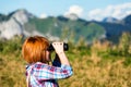 Trekker using binoculars Royalty Free Stock Photo