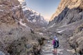 Trekker in the valley on the way to Annapurna base camp, Nepal Royalty Free Stock Photo