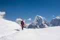 Trekker is walking by Renjo La pass in Everest region