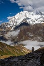 Trekker on the way to the valley covered with cloud on Manaslu c