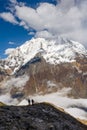 Trekker on the way to the valley covered with cloud on Manaslu c