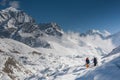 Trekkers crossing Gokyo glacier in Khumbu valley on a way to Eve Royalty Free Stock Photo