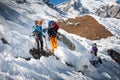 Trekkers are crossing Gokyo glacier in Khumbu valley on a way to Royalty Free Stock Photo