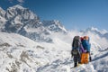 Trekkers crossing Gokyo glacier in Khumbu valley on a way to Eve Royalty Free Stock Photo
