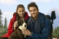 Trekkers with dog taking rest Royalty Free Stock Photo