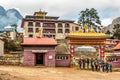 Trekkers entering Buddhist monastery in Tengboche, Nepal Royalty Free Stock Photo