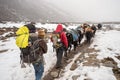 Trekkers, sherpas and yak shepherds in the Himalayan Region Royalty Free Stock Photo