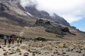 Trekkers on a trail on mount kilamanjaro